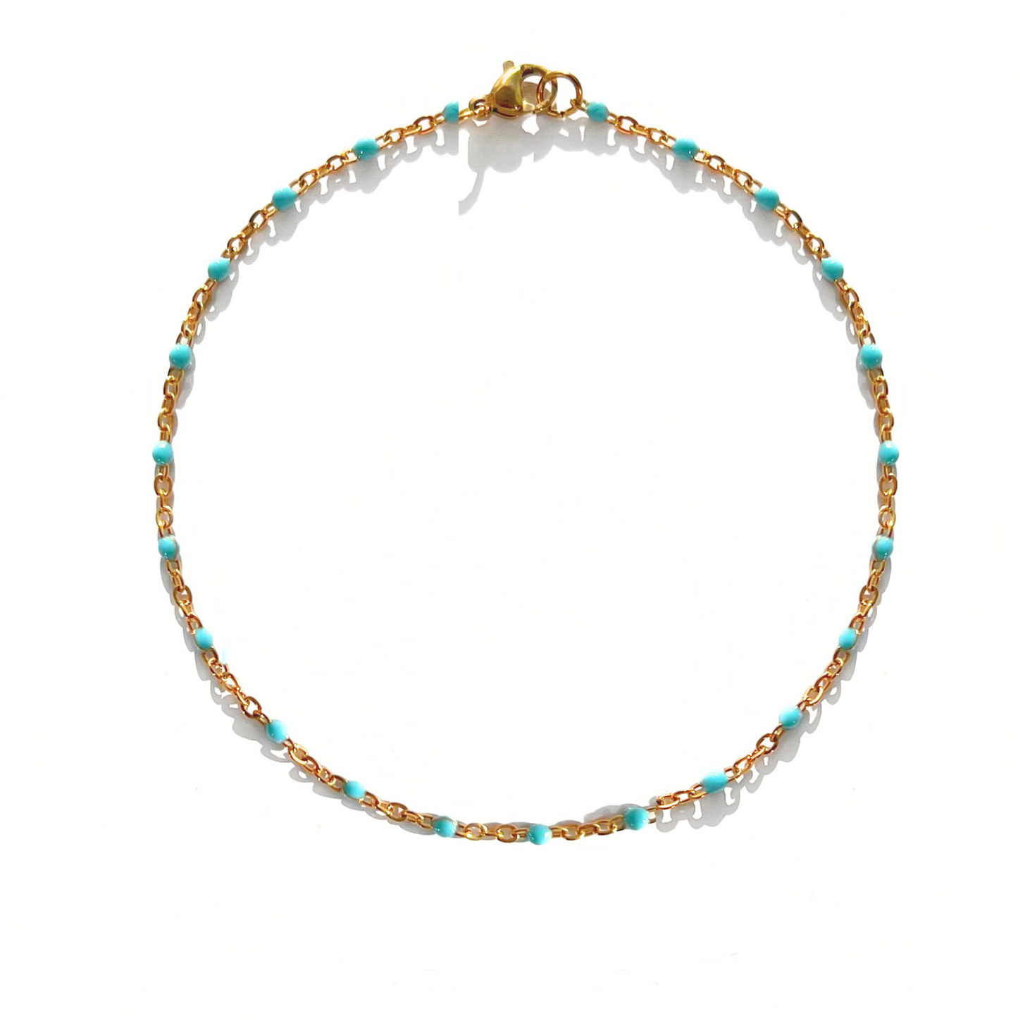 Chaîne cheville boules turquoises