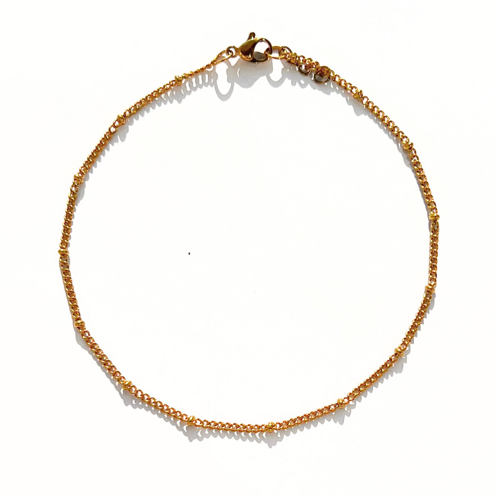 Chaîne cheville boule dorée