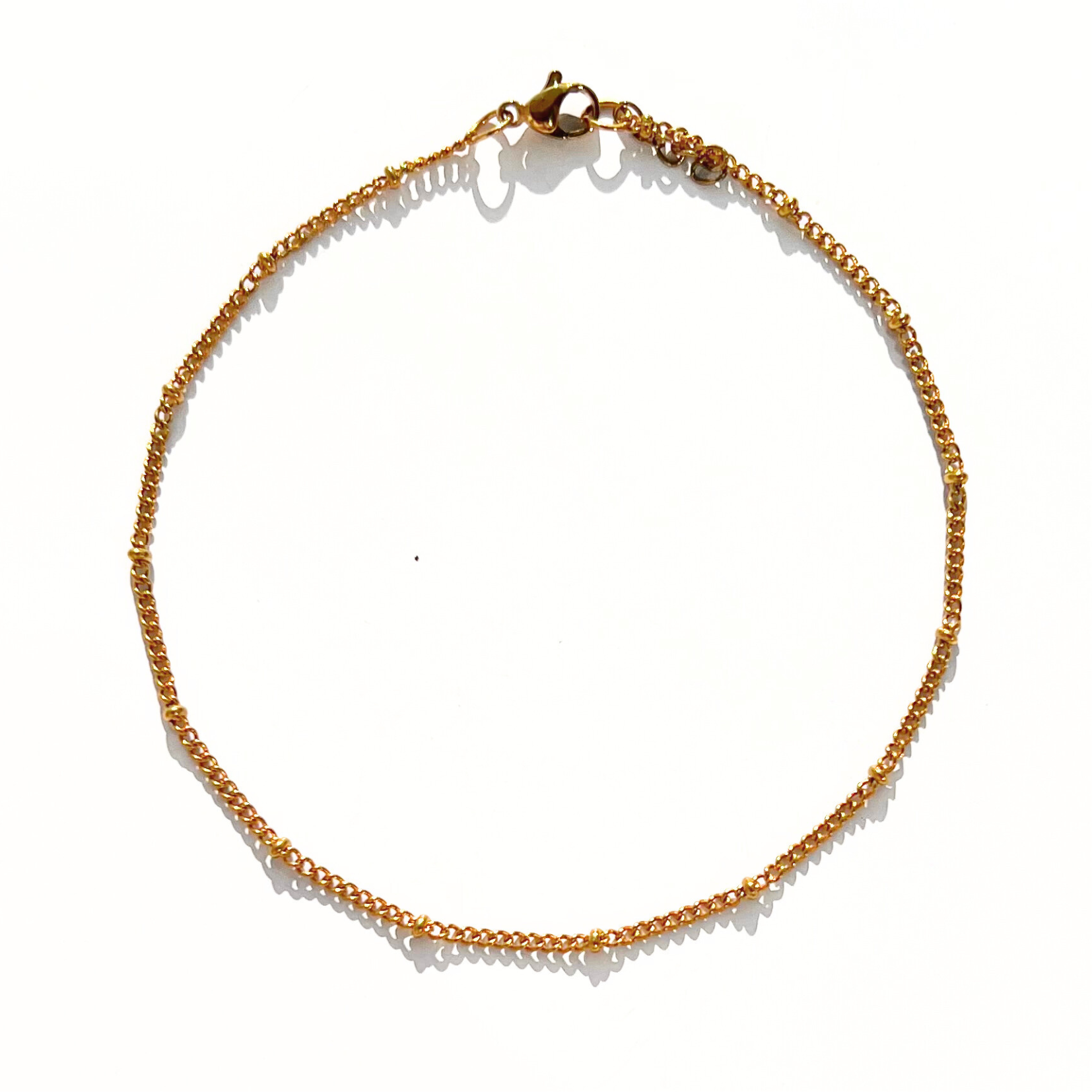 Chaîne cheville boule dorée
