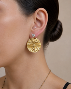 Boucles d'oreilles dorées texturées