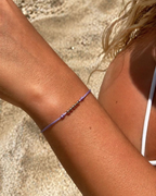 Bracelet cordon boules dorées