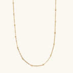 Collier boules dorées